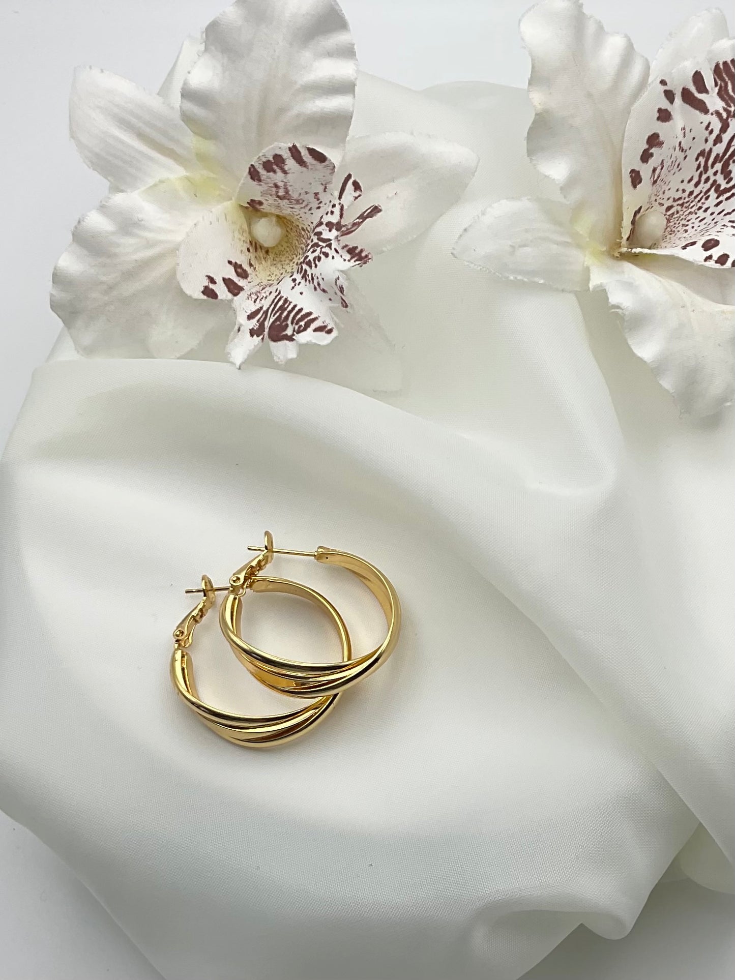 The Golden Twist Hoop Earrings