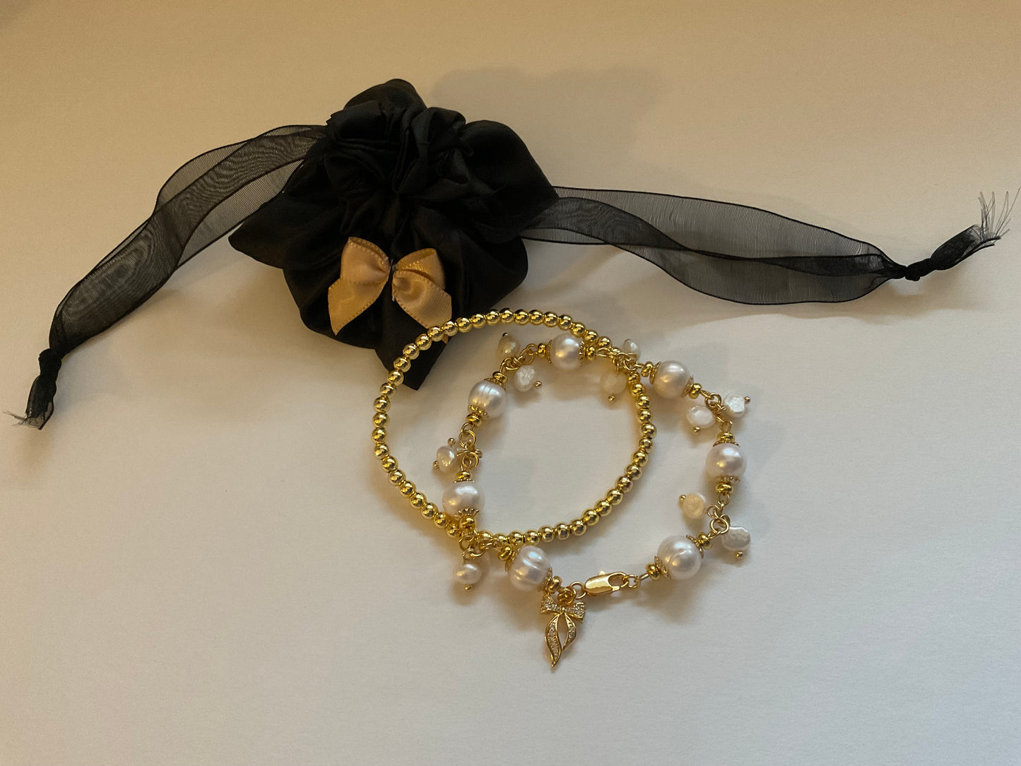 The Pearl Whisper Bow Bracelet