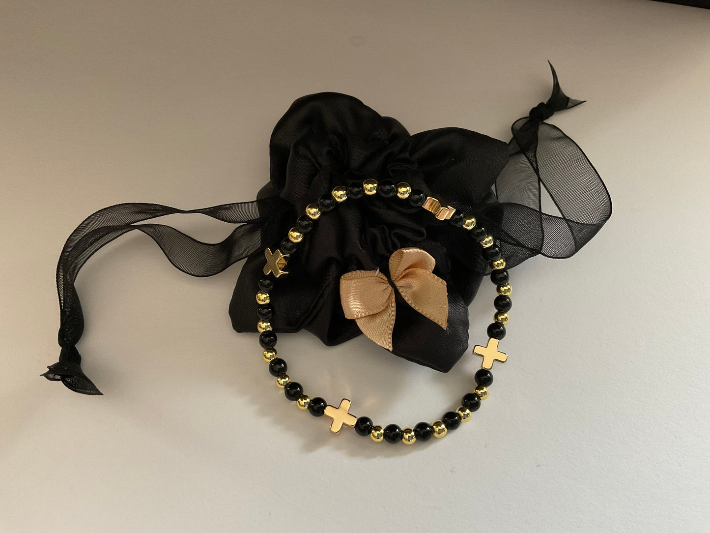 Beaded Stackable Bracelet. Black & 18k gold plated Cross