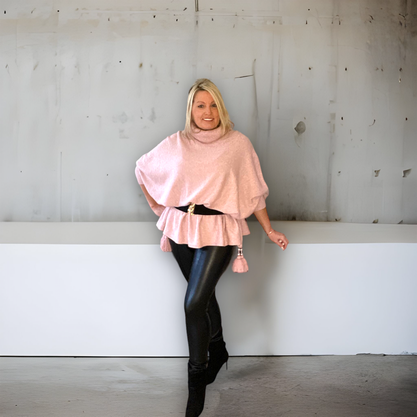 CHANDLER. Super sort roll neck tassel poncho/jumper